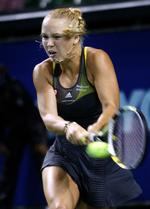 Videre. Caroline Wozniacki havde relativt let spil mod Greta Arn. 
