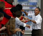 Begejstret. Barack Obama forsøger at puste gejst i Demokraterne forud for Midtvejsvalget. I går talte han på universitetet i Wisconsin. 