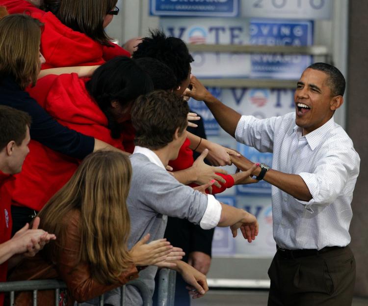 Begejstret. Barack Obama forsøger at puste gejst i Demokraterne forud for Midtvejsvalget. I går talte han på universitetet i Wisconsin. 