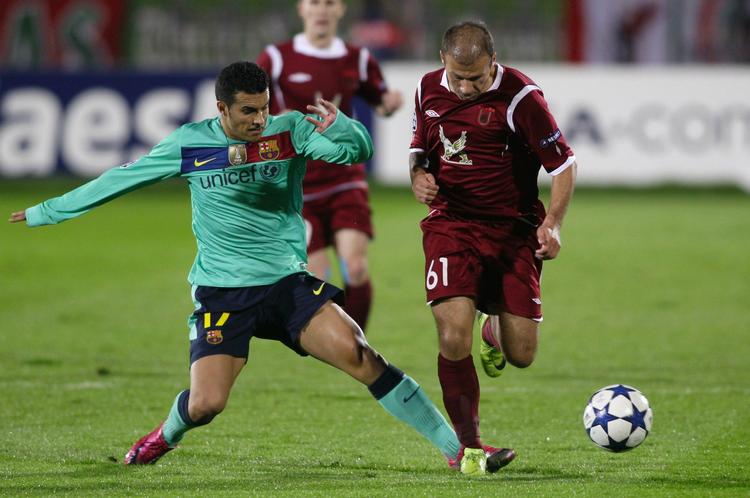 Nærkamp. Barcelonas Pedro Rodriguez (til venstre) misbrugte et par store chancer mod Rubin Kazan. 