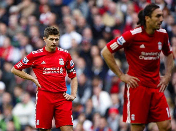 KRISERAMTE. Liverpools Steven Gerrard (til venstre) og Sotirios Kyrgiakos kan få nye chefer, hvis klubben accepterer et af de nye købstilbud. Arkivfoto. 