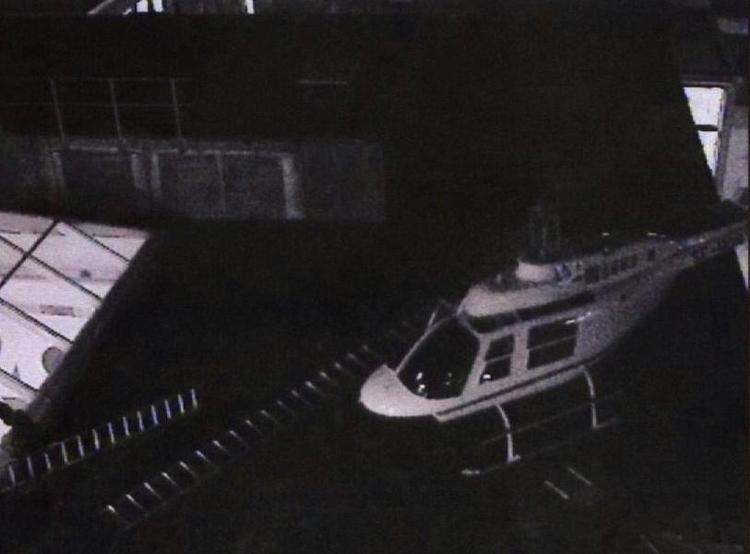 luftbåren. Svensk politi frigav i sommers denne overvågningsbillede af røvernes helikopter på G4S-bygningen i Stockholm. 