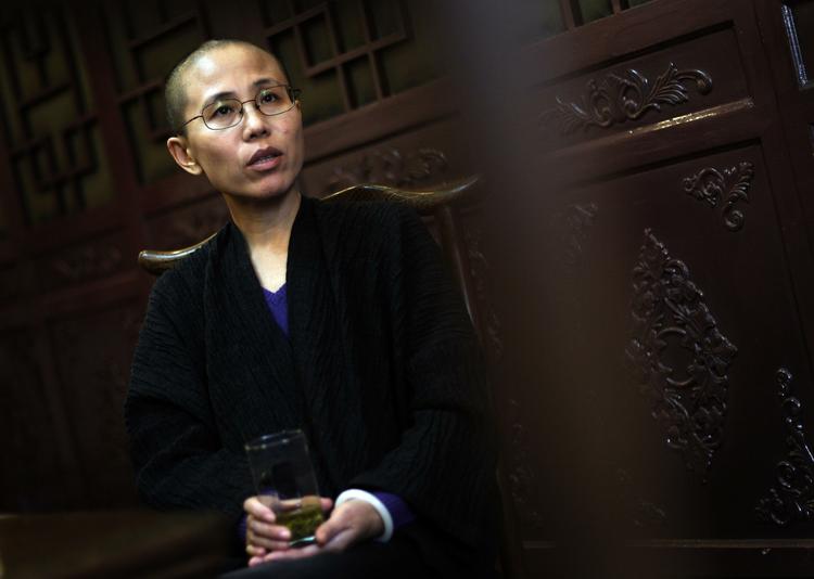 KONTAKT. Ingen har kunnet få kontakt med Nobelprisvinderends kone, Liu Xia, siden hun i går sagde, at politiet tvang hende til at forlade Beijing. 