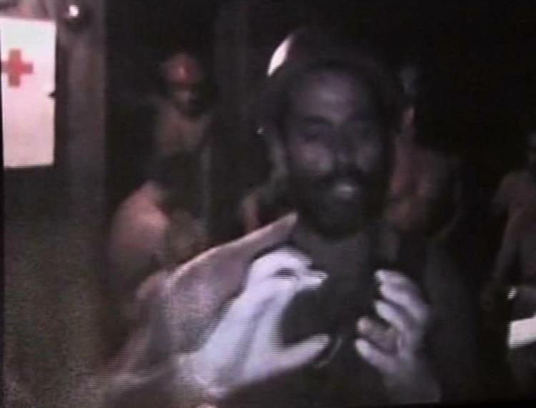 indespærret. Om få timer er de 33 indespærrede minearbejdere forhåbentlig på vej op i friheden igen. 