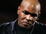 Forsvar. Mike Tyson mener, at han bare forsvarede sig selv og sin familie, da han gav en fotograf et par på hovedet sidste år. Arkivfoto. 