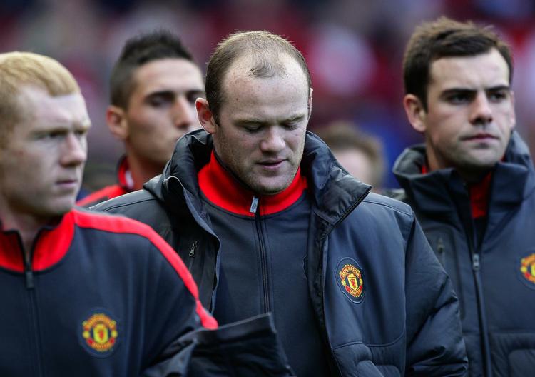 lønkrav. Efter at have erklæret klubben evig troskab for ganske nylig er Wayne Rooney nu røget så meget i clinch med Manchester Uniteds ledelse, at angriberen vil skifte klub. Arkivfoto. 