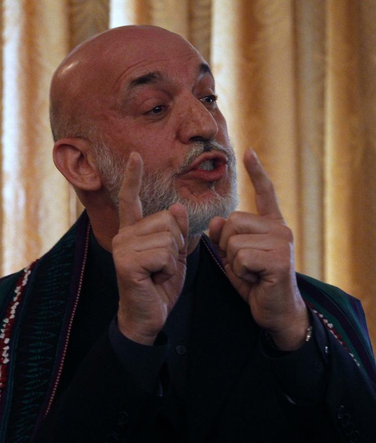 Belønnet. Afghanistans præsident, Hamid Karzai, betragter pengegaverne som en naturlig og »gennemsigtig« hjælp fra et venligtsindet land. 