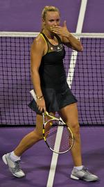 Kys. Trods det varme klima, så er Caroline Wozniacki godt tilfreds med forholdene i Qatar. 