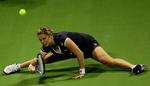 split. Kim Clijsters samler selv de mest umulige bolde op og har et stort slag-repertoire. 