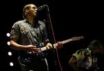 Indiekonger. Win Butler på scenen under Lollapalooza-festivalen i Chicago for tre år siden. Årets festival er i gang i disse dage, og her er der blevet uddelt 'Reflector'-vifter, hvilket formentlig er endnu et hint om, hvad gruppens fjerde album kommer til at hedde. 