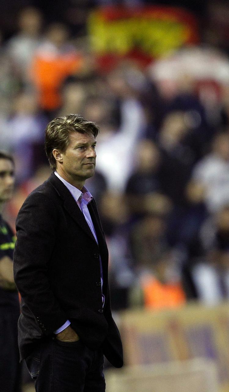 2012. Michael Laudrups aftale med Mallorca udløber meget passende, når Danmark står og mangler en landstræner. 