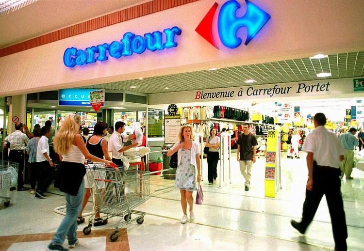 Hvis politikerne vil tillade større butikker, kan megasupermarkeder som det franske Carrefour komme til Danmark. 
