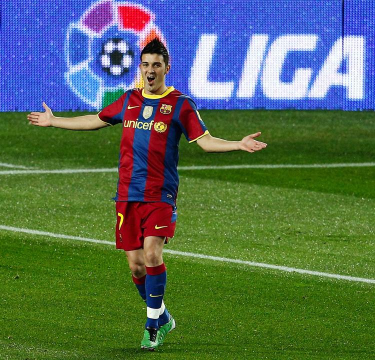 Barcelonas David Villa jubler. 