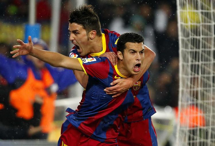 FC Barcelona's Pedro Rodriguez (th) har scoret og jubler sammen med  David Villa. 