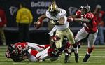 Spurt. Reggie Bush og de øvrige Saints-spillere løb fra Atlanta-holdet. 