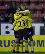 Pointdeling. Arsenal måtte trods en scoring af Nicklas Bendtner nøjes med 2-2 i Wigan. 