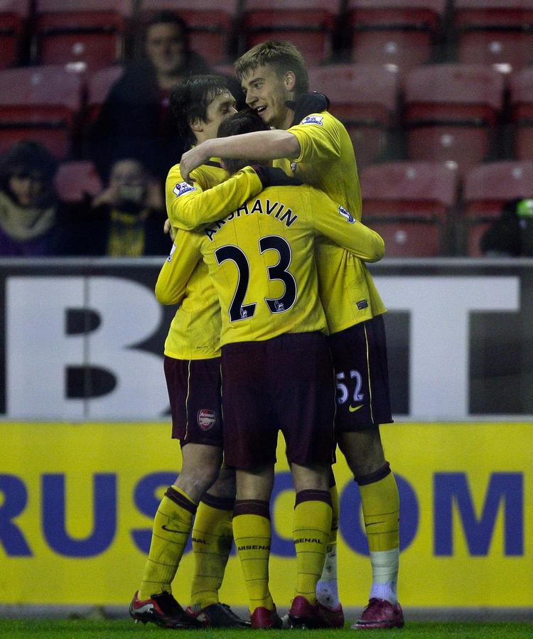 Pointdeling. Arsenal måtte trods en scoring af Nicklas Bendtner nøjes med 2-2 i Wigan. 