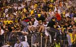 angreb. Jerusalems fodboldstadion Teddy Stadium har  været  i centrum for konlikten mellem israelere og palæstinensere. Fem palæstinensere er nu tiltalt for deres andel i planlægningen af et raketangreb på stadionet. Her er det israelske fodboldfans, der stormer banen efter hjemmebanesejr. 