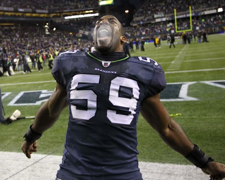 overraskelsen. De forsvarende Super Bowl-vindrere fra New Orleans Saints røg ud i den første kamp i playoff, da Aaron Curry og Seattle Seahawks vandt. 