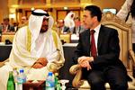 NATO Secretary-General Anders Fogh Rasmussen in conversation in 2009 with Sheikh Thamer Mubarak al-Sabah, vice-president of the Security Bureau of Kuwait. Archive. 