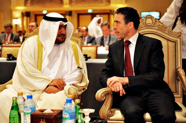 NATO Secretary-General Anders Fogh Rasmussen in conversation in 2009 with Sheikh Thamer Mubarak al-Sabah, vice-president of the Security Bureau of Kuwait. Archive. 