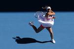 ballerina. Caroline Wozniacki slog næsten ingen vinderslag mod Li Na, mens kineseren bed sig fast i kampen og satsede trods modgang. 