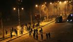 URO. Egyptiske sikkerhedsstyrker kæmper med regeringsjendtlige demonstranter i Suez. 