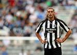 skifte. Andy Carroll er bundet til Liverpool til sommeren 2016. 