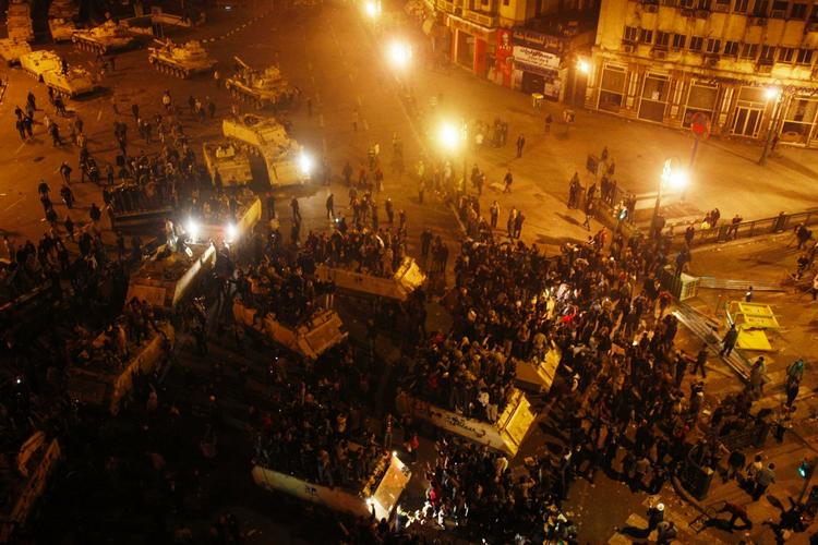 Offer. Det var under uro sidste fredag på Tahrir-pladsen - hvor dette billede er fra, at en egyptisk fotograf blev skudt. 