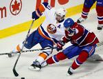 milepæl. New York Islanders Frans Nielsen (51) kæmper om pucken med Montreal Canadiens Max Pacioretty i opgøret, hvor danskeren rundede de 100 NHL-point. 