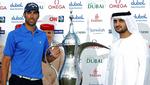 trøst. Som en ubetydelig opmuntring kan Anders Hansen glæde sig over, at han i modsætning til vinderen Alvaro Quiros ikke skal slæbe af med vindertrofæet fra Dubai Desert Classic. 