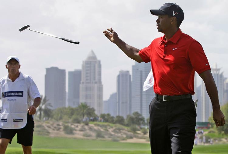 grib. En dobbeltbogey på sidste hul i Dubai kostede en del placeringer i slutstillingen for Tiger Woods, der ikke har vundet en turnering siden november 2009. 