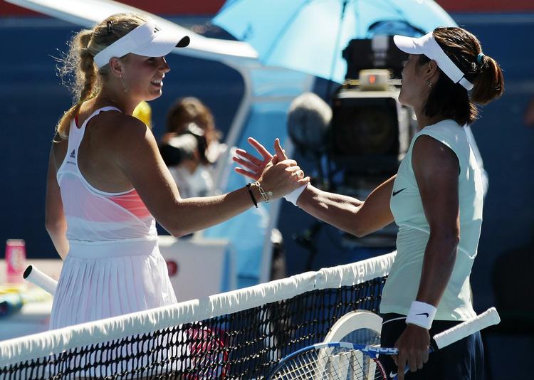 revanche. Tre gange i træk har Caroline Wozniacki tabt til kineseren Li Na. 