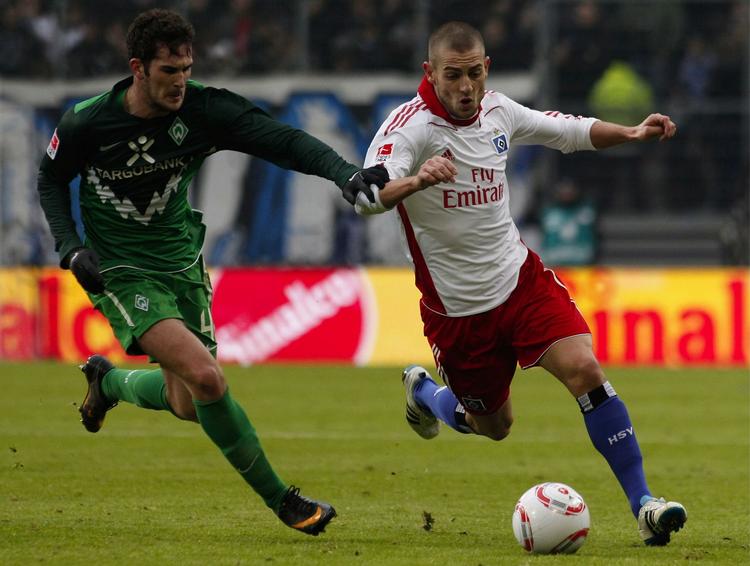 Igangsætter. Mladen Petric (t.h.) havde overlevet HSV-trænerens storvask og scorede til 1-0 mod Bremen, der ikke havde danske Daniel Jensen med. 