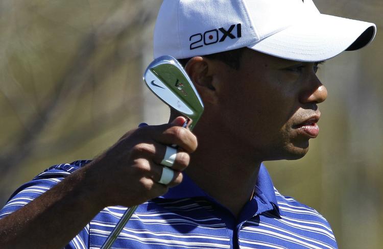 hulspil. Klokken 19.45 i aften skal Tiger Woods spille mod Thomas Bjørn i Arizona. 