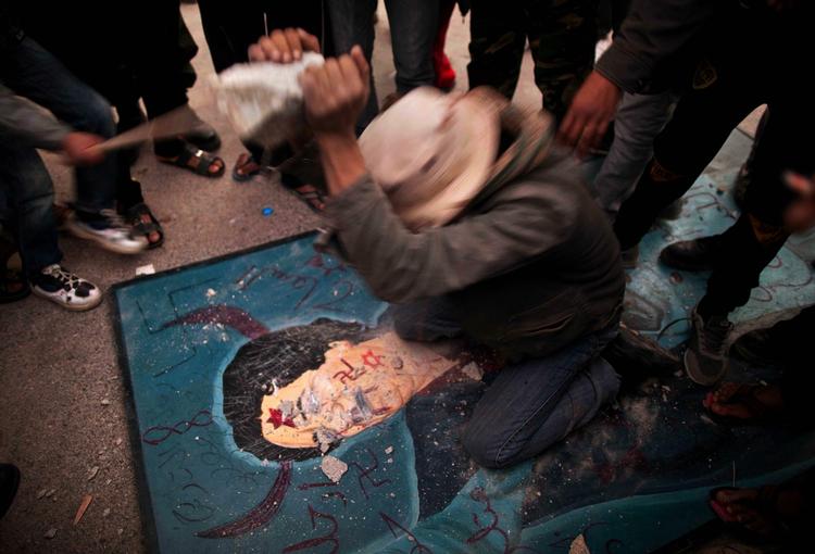 Krigsforbryder? FN's Sikerhedsråd kunne ikke nå til enighed om, hvorvidt Libyens leder, Moamar Gaddafi, skal stævnes for den internationale krigsforbryderdomstol i Haag. 