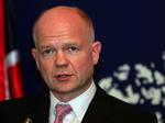 Udenrigsminister. William Hague øger presset på Moamar Gaddafi med diplomatisk træk. 