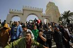 Krigshandlinger. Flere steder har der været voldsomme kampe i Libyen. Billedet viser regeringsfjentlige demonstranter i hovedstaden Tripoli. 