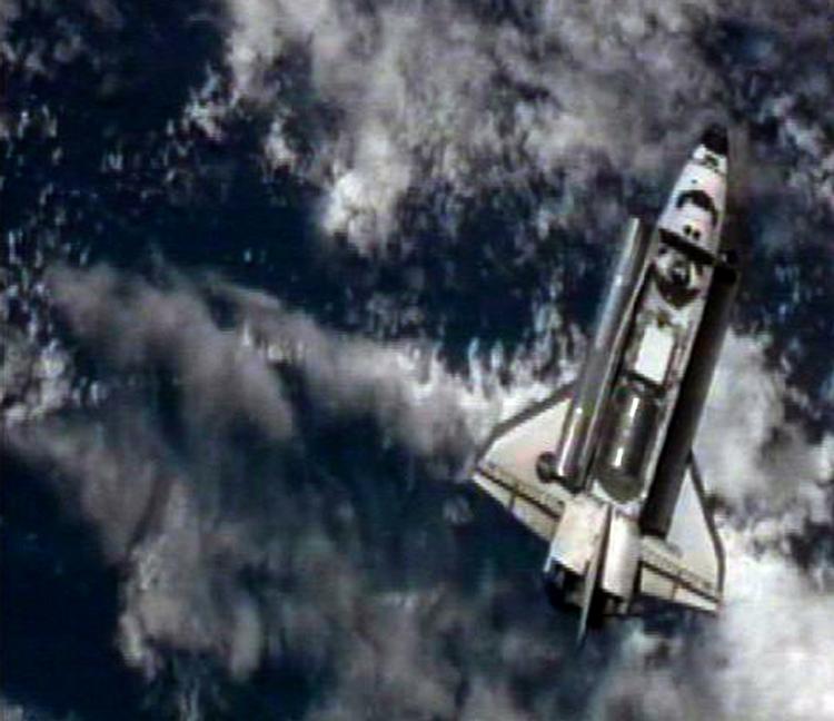 Svanesang. Billedet fra rumfærgen Discoverys sidste flyvetur er taget fra en NASA-video. 