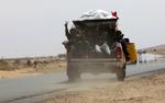 FLUGT. Oprørsstyrkerne i Libyen har opgivet at kæmpe mod regeringsstyrkerne i byen Ras Lanuf. 