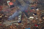 Tsunami. Et skib er blevet skyllet ind midt i byen Kesennuma i det nordøstlige Japan. 