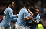 Afgørelsen. Med sit mål mod Reading sendte Micah Ricards (nr. to fra højre) Manchester City i FA Cup-semifinalen. 