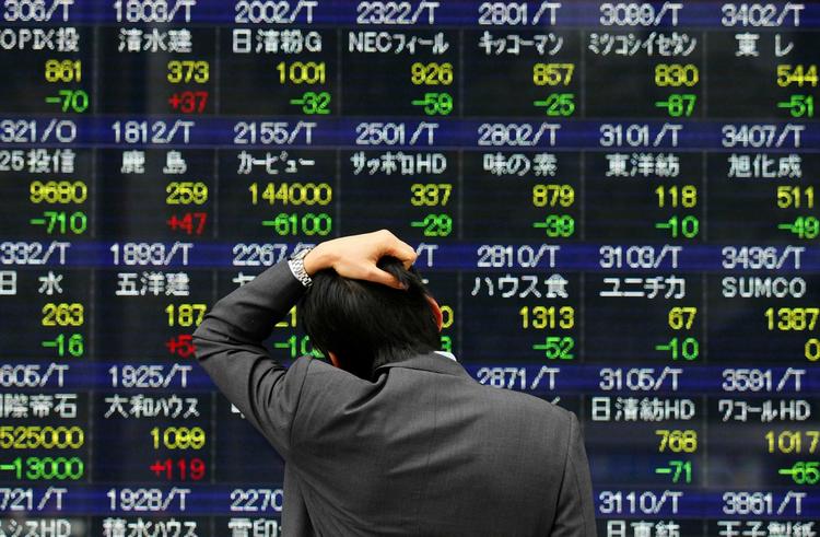 Nedtur. Det såkaldte Nikkei-indeks er faldet med mere end 14 procent siden jordskælvet og tsunamien. 