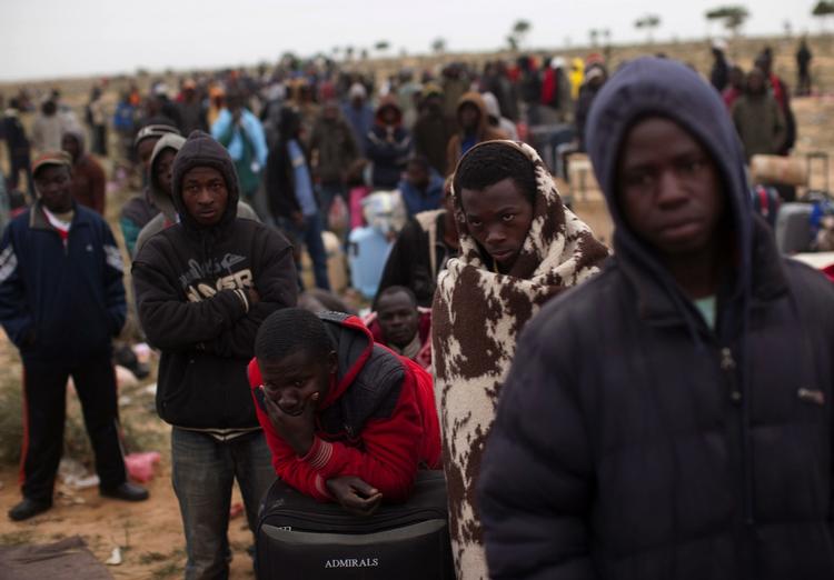 flugt. Folk, der er flygtet fra urolighederne i Libyen, samles i flygtningelejre ved grænsen til Tunesien. Libyens befolkning fortjener at få hjælp fra omverdenen, siger den konservative udenrigsordfører, Naser Khader. 