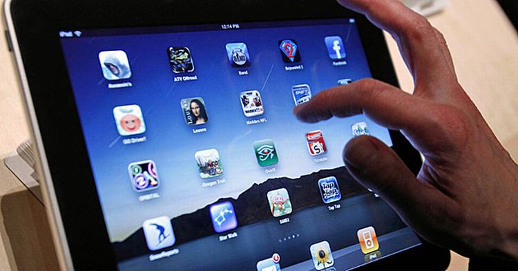 REJSEKAMMERAT. Kan iPad'en erstatte alle rejsesagerne i din rygsæk? 
