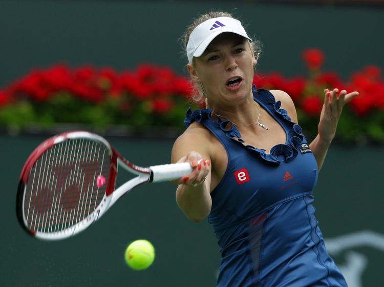 Vinder. Wozniacki spillede et næsten perfekt første sæt, hvor hun lagde et kæmpe pres på sin modstander og fint fandt linjerne. 