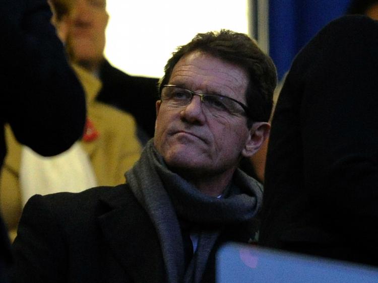 Glad. Fabio Capello fastholder, at han stadig er glad for jobbet som engelsk landstræner. 