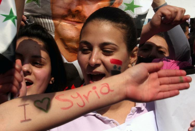 Størttedemonstration. Tilhængere af præsident Bashar Assad er på gaden i Damaskus. 