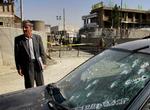 Angreb. Udenlandske ansatte i Afghanistan er nervøse, efter både FN og Nato er blevet angrebet. Her ses nogle af efterladenskaberne af morgenens angreb mod Nato i Kabul. 