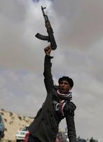 Kampklar. En libysk oprører nær frontlinjen i Brega. 